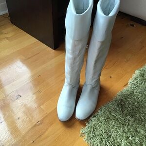 Tall white boots